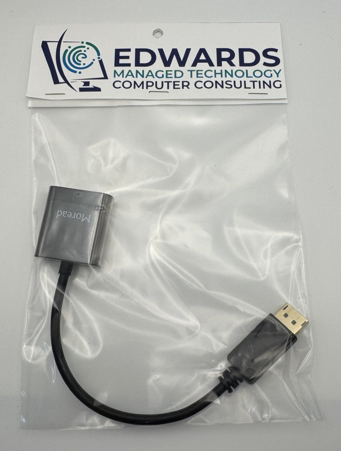 USB adapter cable in clear packaging with Edwards Computer Consulting label on a white background