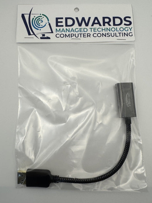 Black adapter cable in a clear plastic bag with Edwards Managed Technology Computer Consulting label on a white background