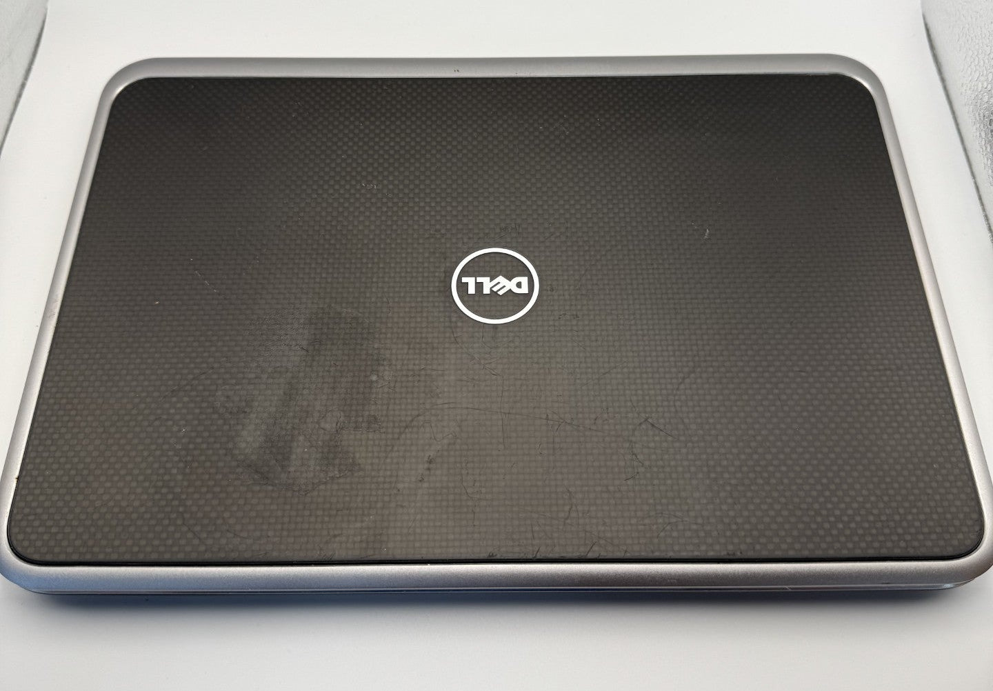 Dell laptop on a white surface